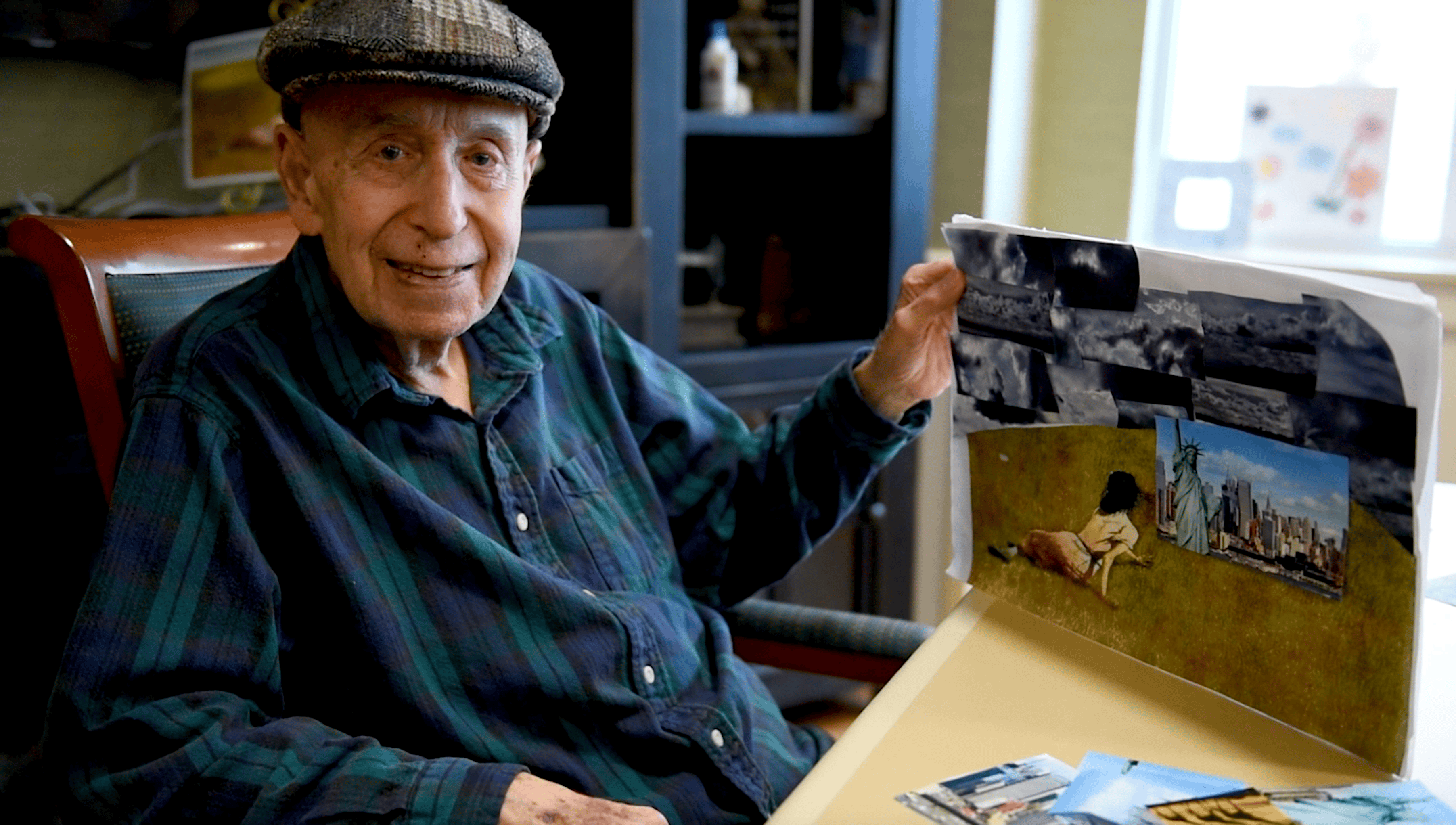 Willow Gardens Memory care resident proudly showing collage