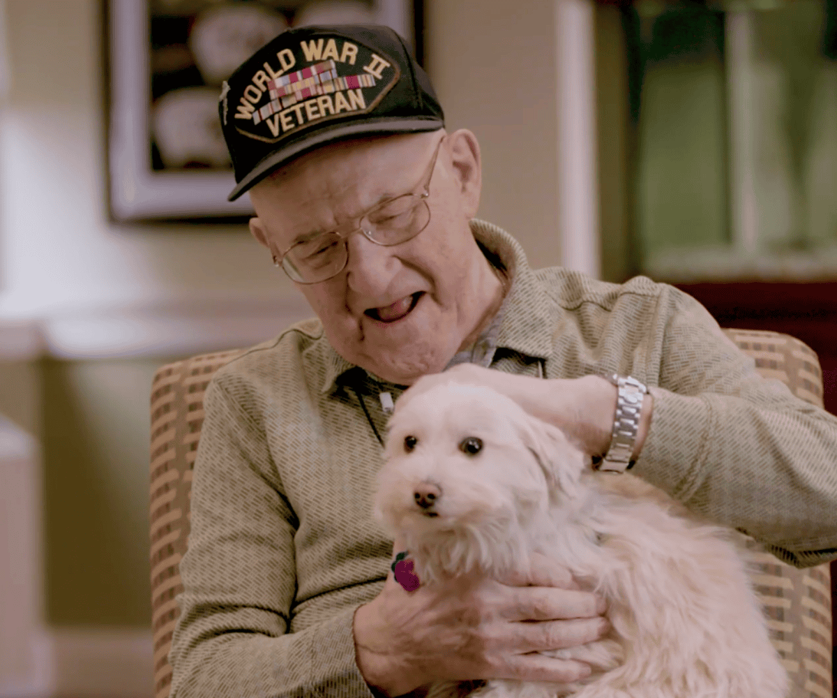 WWII veteran assisted living resident with dog